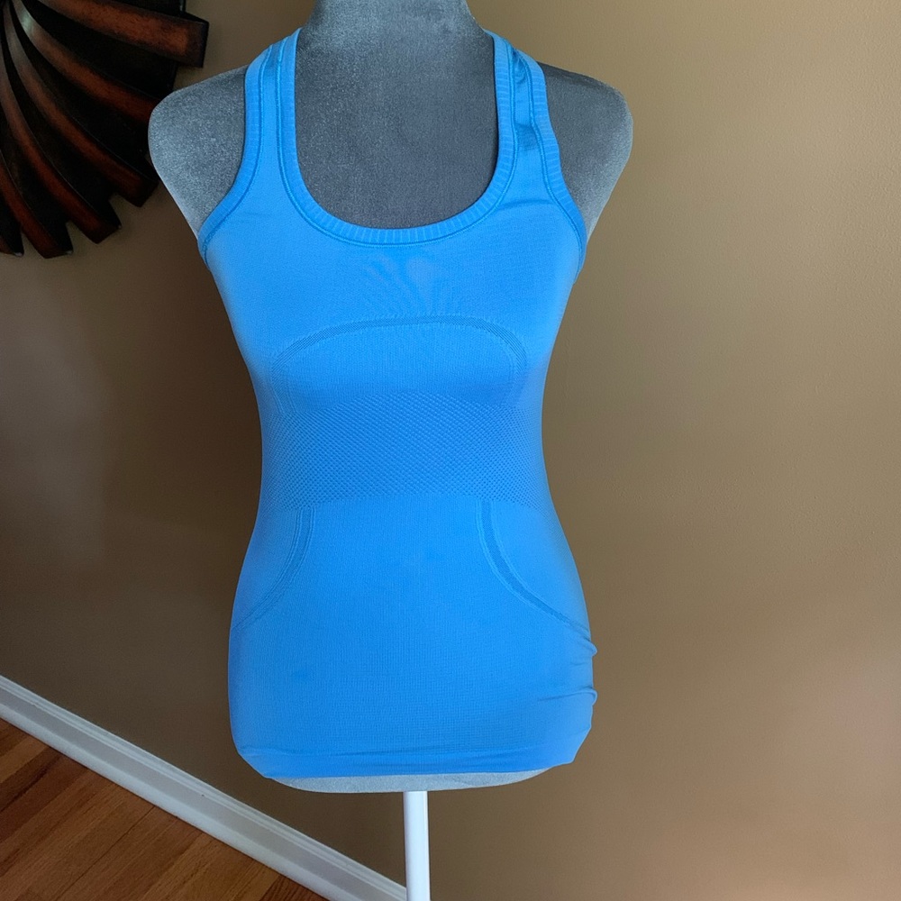 Blue lululemon swiftly tech razorback tank top. Size 2 excellent condition.